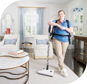 Maid with cleaning tool